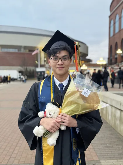 Bao Vo in graduation attire at the University of Michigan, 2023.